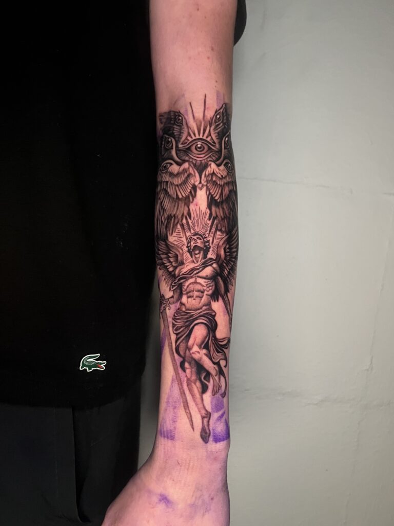 Black and grey realism ascending angel tattoo with flowing wings