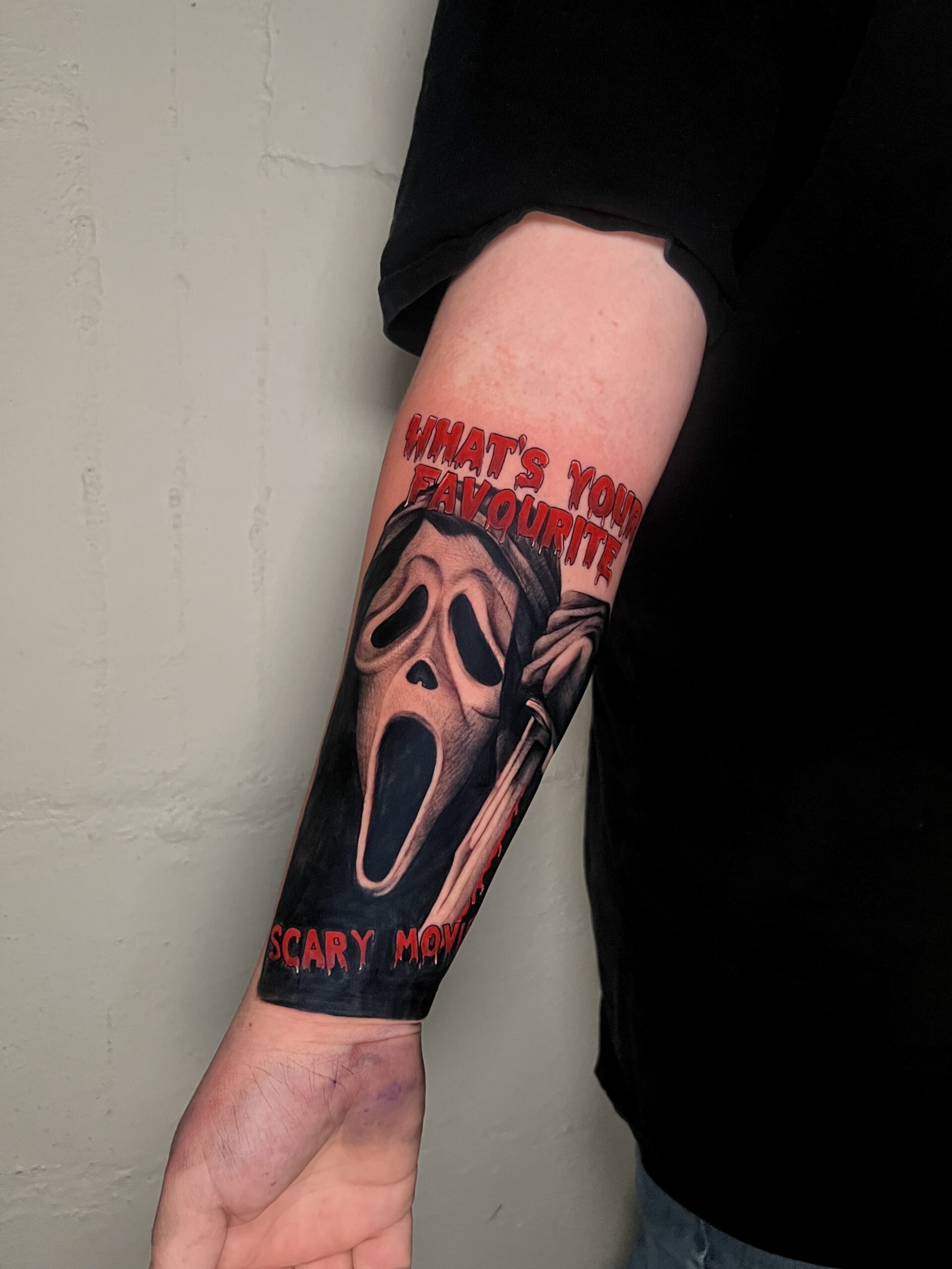 Close up of a black and grey realism tattoo with detailed shading and contrast