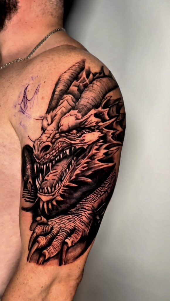 Realistic black and grey dragon tattoo with dynamic movement and scales